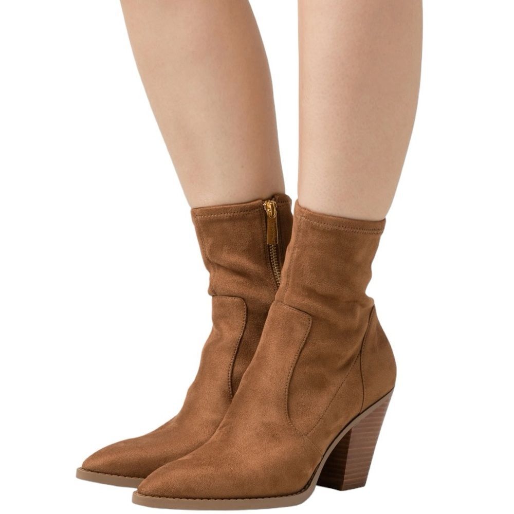 Michael Michael Kors size 9. Dover Heeled Bootie. 3 1/2 heeled boot.